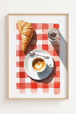 Plakat med croissant, cappuccino og rødternet dug i lys træramme – hyggelig fransk caféstemning til køkkenet.
