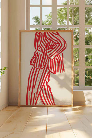 Rød figurplakat med organiske linjer og grafisk balance på lys baggrund i træramme
