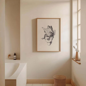 Humor plakat til badeværelset med illustration af en frø, der sidder på toilettet og læser avis i sort-hvid stil.