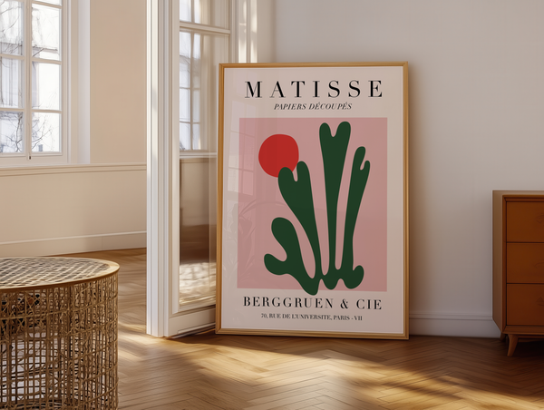 Abstrakt Matisse plakat med grønne bladformer og rød cirkel på rosa baggrund.