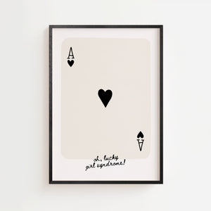 Oh lucky girl syndrome plakat med hjerteres og håndskrevet tekst i sort-hvid, sort ramme