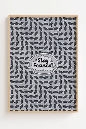 Stay Focused motivationsplakat med tekst i talesky og mønster af mørke ovaler