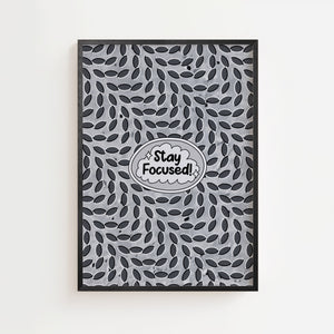 Stay Focused motivationsplakat med tekst i talesky og mønster af mørke ovaler, sort ramme